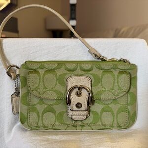 Coach Green Clutch with Monogram Pattern and Metallic Hardware